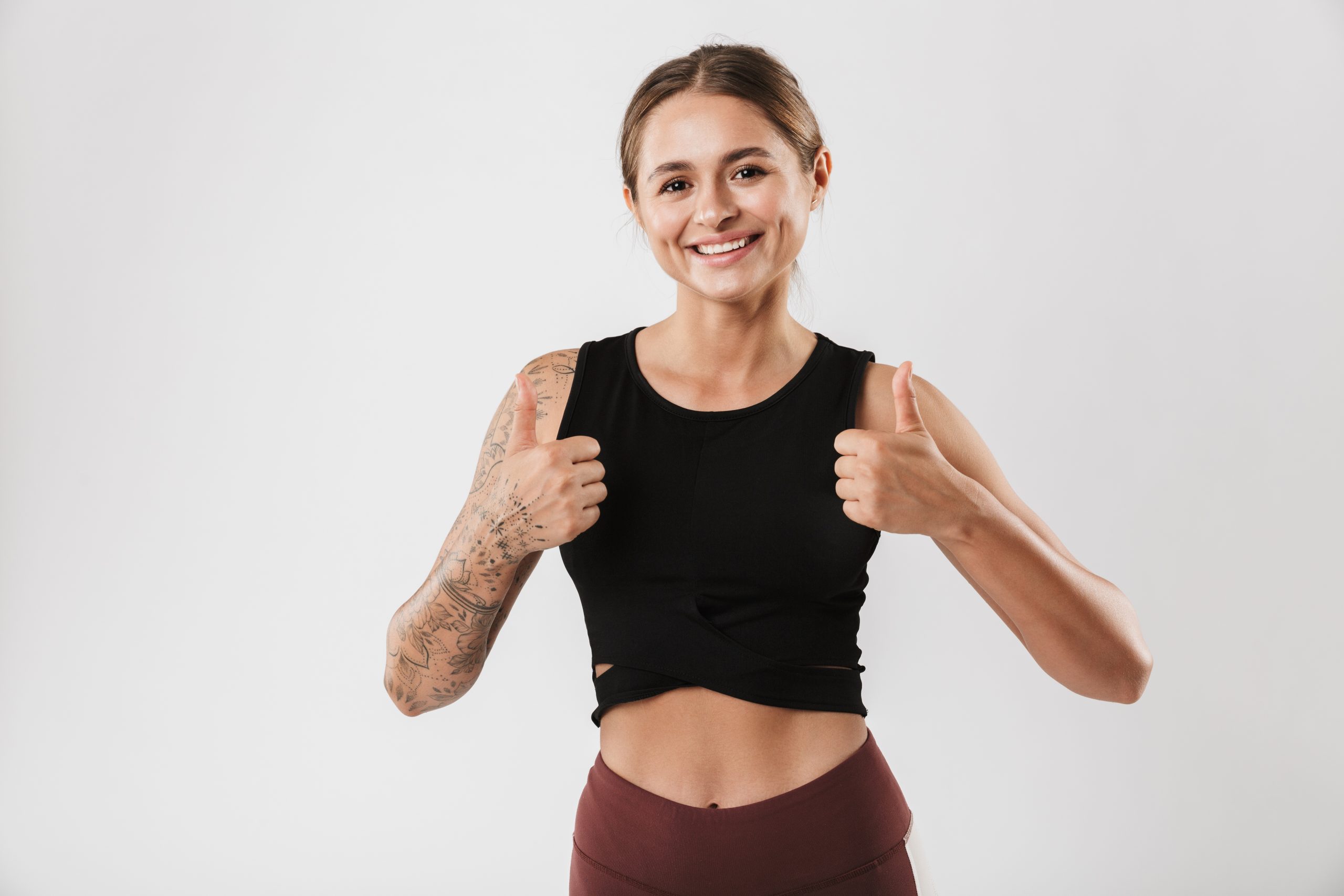 photo of attractive woman in sportswear smiling an YY8RH7C scaled – MYFITAPE